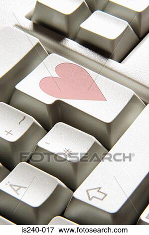 Stock Photo - Heart shape on computer key. Fotosearch