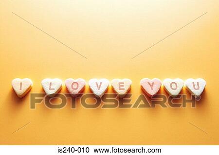 Message on heart shaped sweets View Large Photo Image Stock Image - Message on heart shaped sweets. Fotosearch