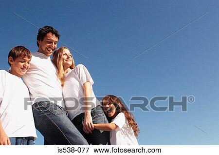 Picture - A happy family. Fotosearch - Search Stock Photography, Photos, Prints, Images, and Photo Clipart