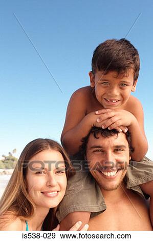 Stock Photo - Portrait of a happy family. Fotosearch