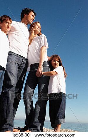 Young family on a sunny day View Large Photo Image Stock Image - Young family on a sunny day . Fotosearch