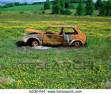 Abandoned car in a field View Large Photo Image Picture - Abandoned car in a field. Fotosearch