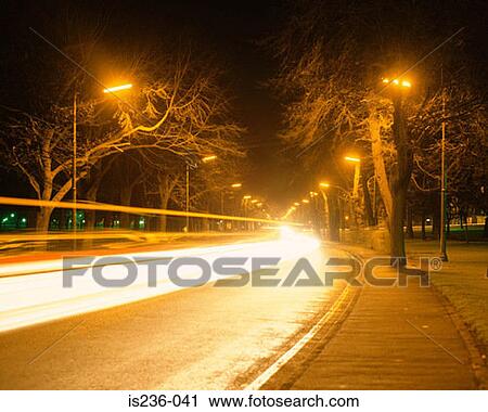 Stock Image - Light on road. Fotosearch