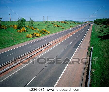 Stock Photography - Road through countryside. Fotosearch