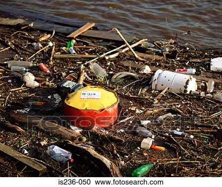 Stock Image - Rubbish by water. Fotosearch