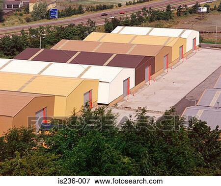 Stock Photo - Warehouses by motorway. Fotosearch