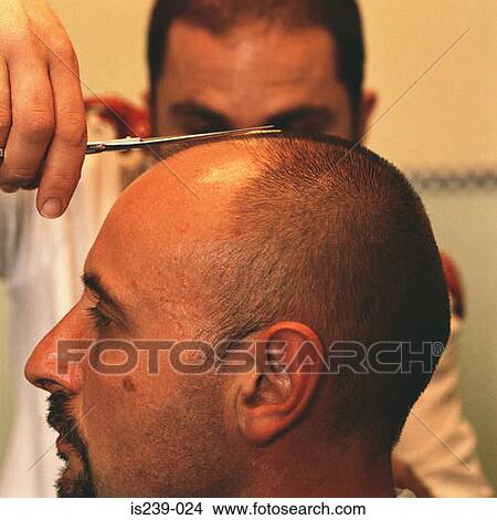 Barber cutting hair View Large Photo Image Picture - Barber cutting hair. Fotosearch