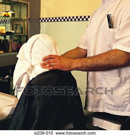 Barber drying boys hair View Large Photo Image Stock Image - Barber drying boys hair. Fotosearch