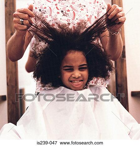 Girl at hairdressers View Large Photo Image Stock Photo - Girl at hairdressers. Fotosearch