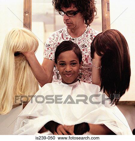 Hairdresser with wigs View Large Photo Image Stock Image - Hairdresser with wigs. Fotosearch