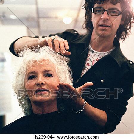 Woman having haircut View Large Photo Image Picture - Woman having haircut. Fotosearch