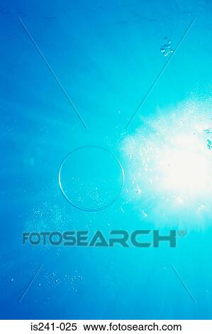 Stock Photography - Air bubbles in sea. Fotosearch