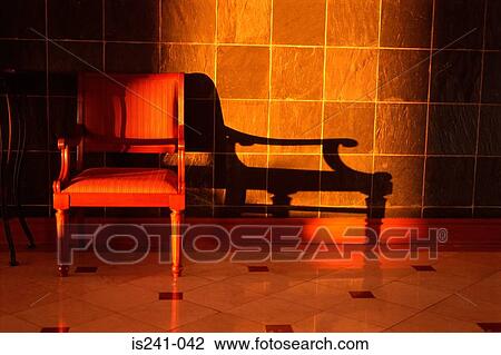 Stock Image - Shadowed chair. Fotosearch