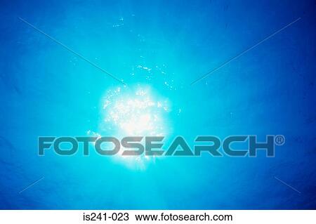 Sunlight through sea View Large Photo Image Stock Image - Sunlight through sea. Fotosearch