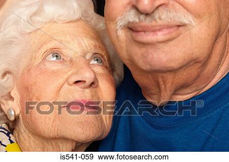 Elderly couple cheek by jowl View Large Photo Image Stock Photo - Elderly couple cheek by jowl. Fotosearch