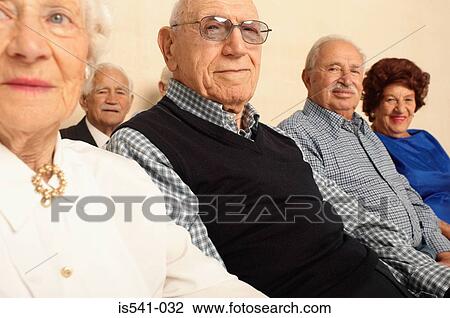 Elderly people seated facing camera View Large Photo Image Stock Image - Elderly people seated facing camera. Fotosearch