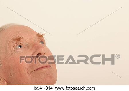Face of older man looking up View Large Photo Image Picture - Face of older man looking up. Fotosearch