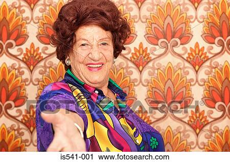 Stock Image - Flamboyant older woman. Fotosearch
