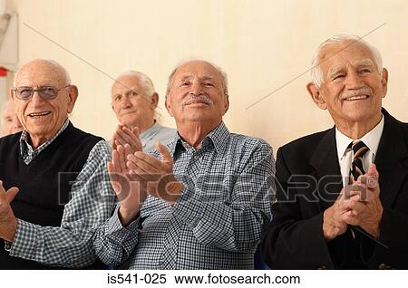 Stock Photography - Group of elderly men applauding. Fotosearch