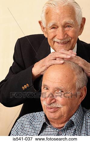 Jovial portrait of two elderly men View Large Photo Image Stock Photo - Jovial portrait of two elderly men. Fotosearch