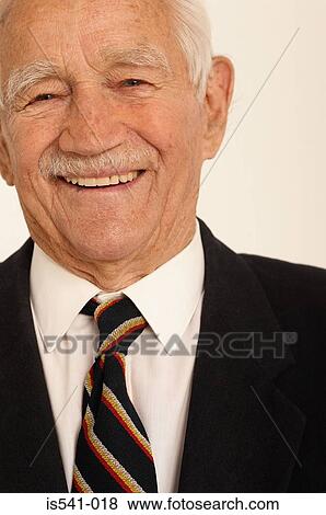 Stock Photo - Portrait of smiling elderly man. Fotosearch