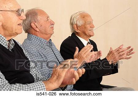 Three elderly men applauding View Large Photo Image Stock Photograph - Three elderly men applauding. Fotosearch