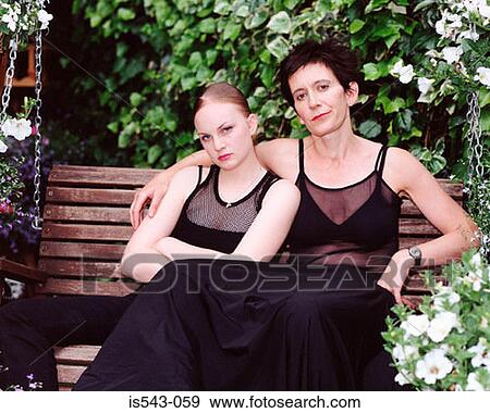 Mother and daughter on bench View Large Photo Image Stock Photo - Mother and daughter on bench. Fotosearch