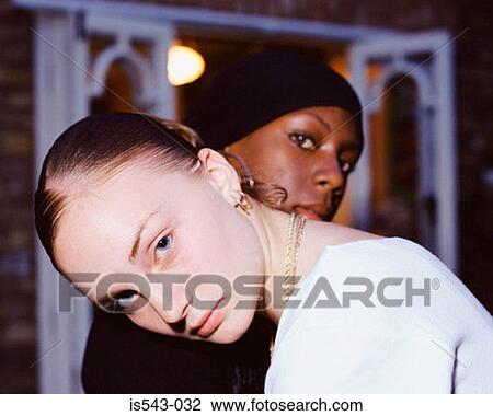Teenage couple hugging View Large Photo Image Stock Image - Teenage couple hugging. Fotosearch