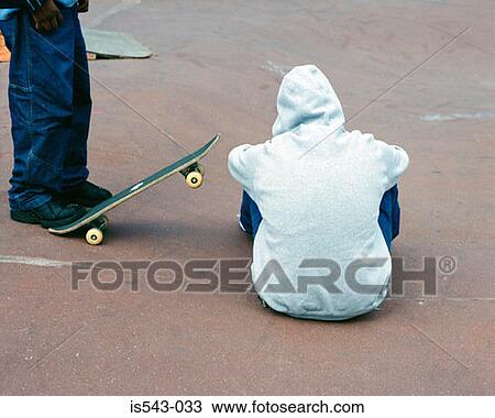 Teenagers in skateboard park View Large Photo Image Stock Image - Teenagers in skateboard park. Fotosearch