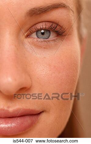 Stock Photo - Partial portrait of young woman. Fotosearch