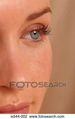 Stock Image - Partial view of female face. Fotosearch