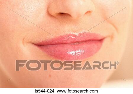 Smiling lips of young woman View Large Photo Image Picture - Smiling lips of young woman. Fotosearch