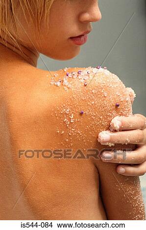 Young woman exfoliating arm View Large Photo Image Picture - Young woman exfoliating arm. Fotosearch