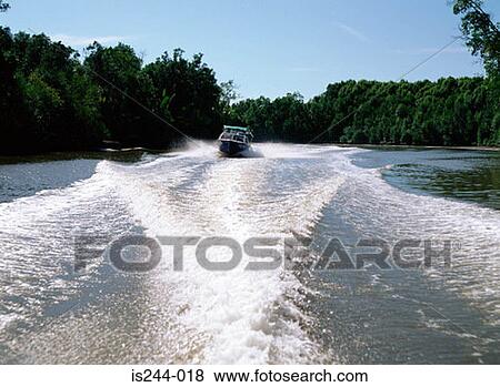 Speedboat on a river View Large Photo Image Stock Photo - Speedboat on a river. Fotosearch