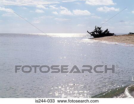 Stock Image - Sun reflection on water. Fotosearch