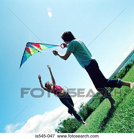 blue sky, friend, friendship, fun, grass View Large Photo Image Stock Photo - blue sky, friend, friendship, fun, grass. Fotosearch