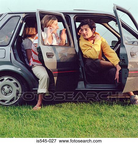 car, friend, friendship, grass, holiday View Large Photo Image Stock Photo - car, friend, friendship, grass, holiday. Fotosearch