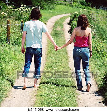 country road, countryside, couple, holding hand, holiday View Large Photo Image Stock Photo - country road, countryside, couple, holding hand, holiday. Fotosearch