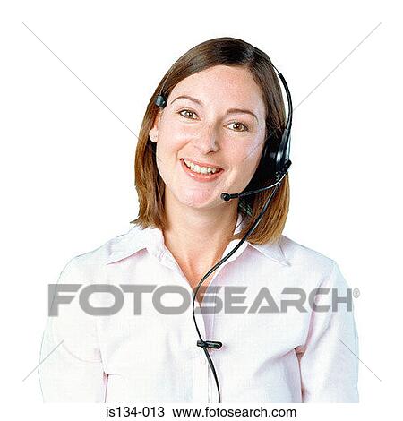 Stock Image - call centre operator, Caucasian, female, indoors. Fotosearch