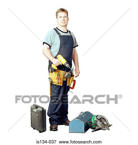 Stock Photo - carpenter, Caucasian, electric drill, handy man. Fotosearch