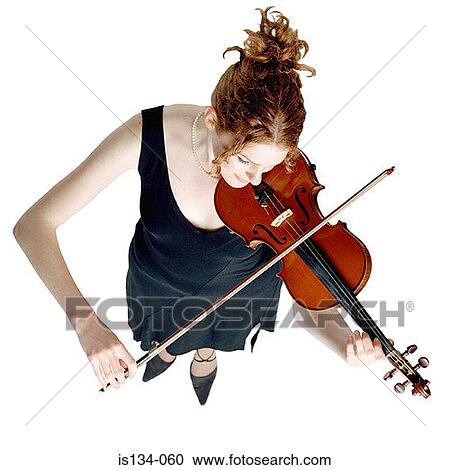 Caucasian, dress, female, holding, indoors View Large Photo Image Stock Image - Caucasian, dress, female, holding, indoors. Fotosearch