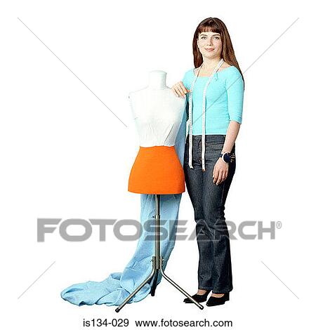 Caucasian, dressmaker, female, indoors View Large Photo Image Stock Photo - Caucasian, dressmaker, female, indoors. Fotosearch