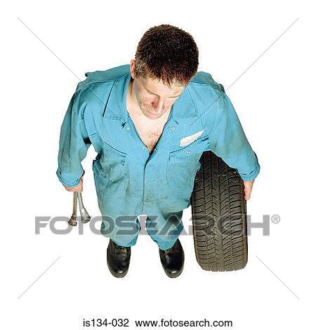Caucasian, holding, indoors, looking at camera View Large Photo Image Stock Image - Caucasian, holding, indoors, looking at camera. Fotosearch