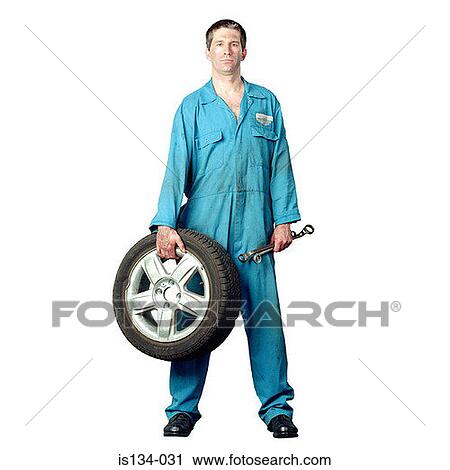 Stock Image - Caucasian, holding, indoors. Fotosearch