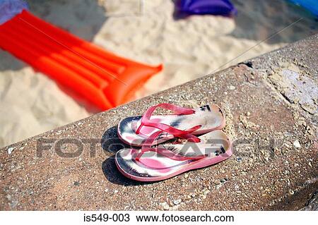 Flip-flops on the beach View Large Photo Image Stock Image - Flip-flops on the beach. Fotosearch