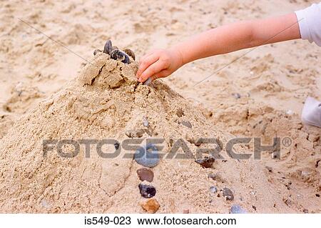 Playing in the sand View Large Photo Image Stock Image - Playing in the sand. Fotosearch