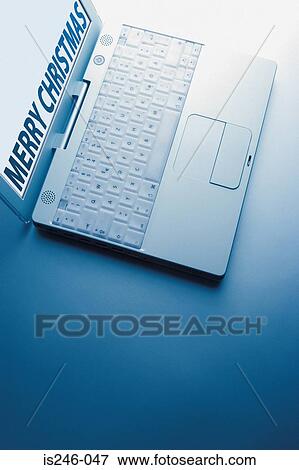 Merry Christmas display on laptop View Large Photo Image Stock Photo - Merry Christmas display on laptop. Fotosearch