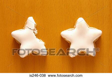 Stock Photo - Star shaped iced biscuits. Fotosearch