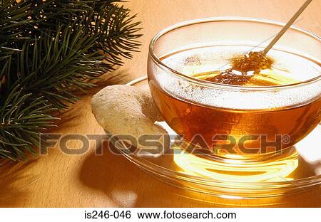 Stock Photograph - Tea biscuit and candy stick. Fotosearch
