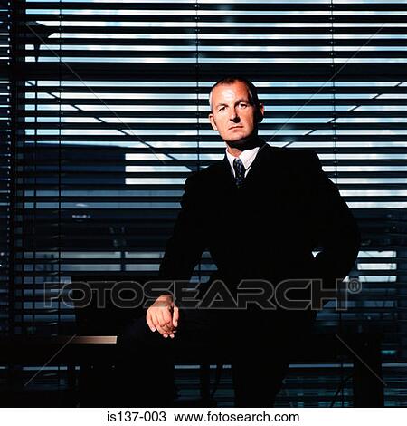 Stock Image - Businessman at work. Fotosearch